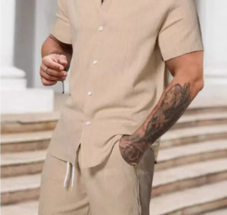 Men's striped printed casual suit set featuring a short sleeve shirt and matching shorts on a hanger.