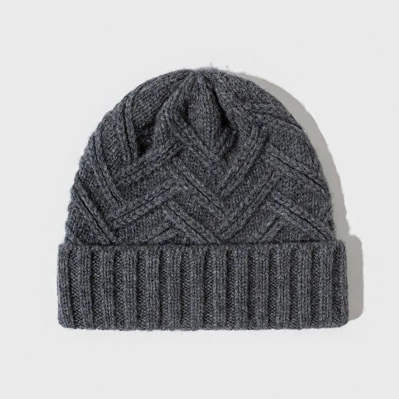 Wool knitted hat with dome crown in totem pattern, shown in ankela red colour