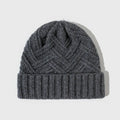 Wool knitted hat with dome crown in totem pattern, shown in ankela red colour