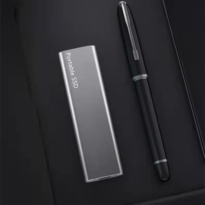 Red interface mobile SSD with metal shell showing ultra-thin design and 10TB capacity label