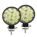 White mini round aluminium LED work light with IP67 rating for vehicle use.