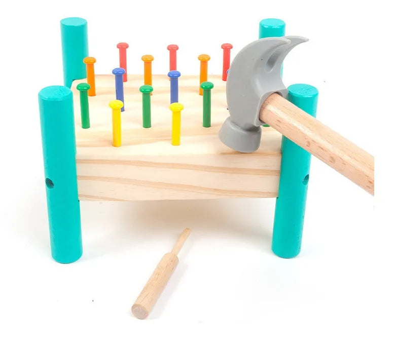 Wooden hammering nail toy with 17 coloured nails, hammer, reverse knock and nail plate, 19 x 13.5 x 16 cm