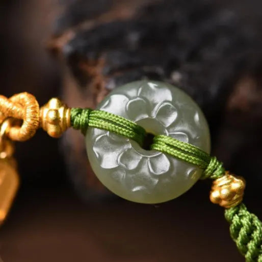 Hand-woven corn knot bracelet with Hetian jade safety buckle on green flexible wire