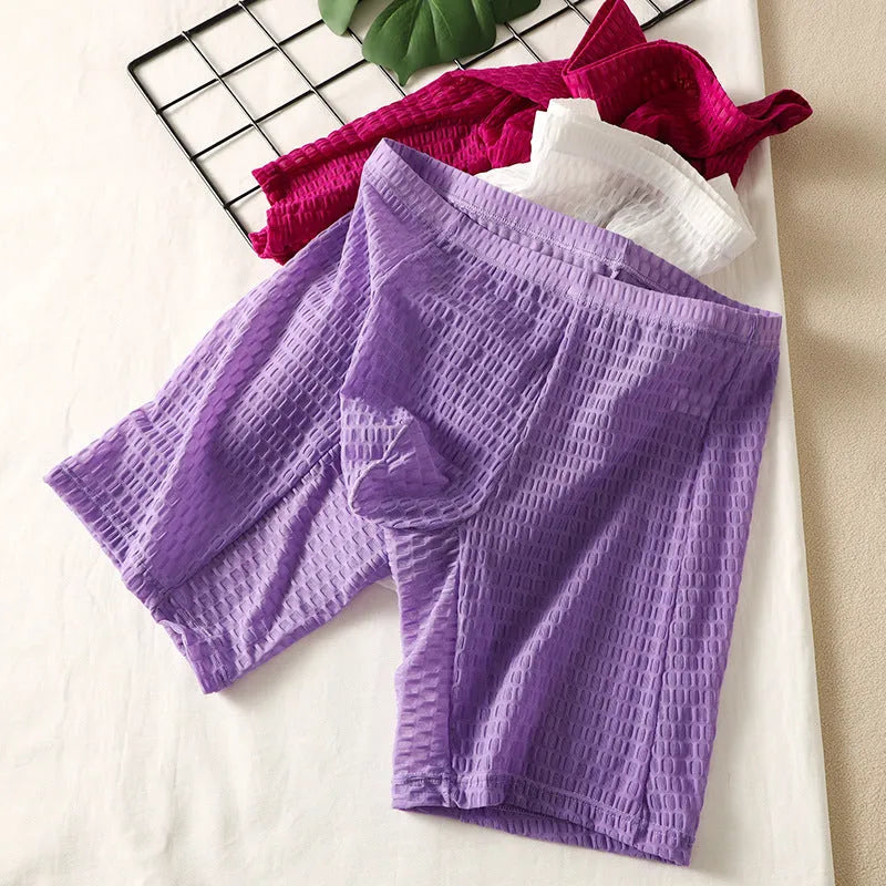 Men's lace shaping boxer briefs in light purple on a white background, showing the hip-lifting design.