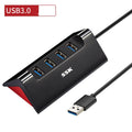 Black USB expansion dock with 4 ports and Micro USB power input on compact ABS plastic housing