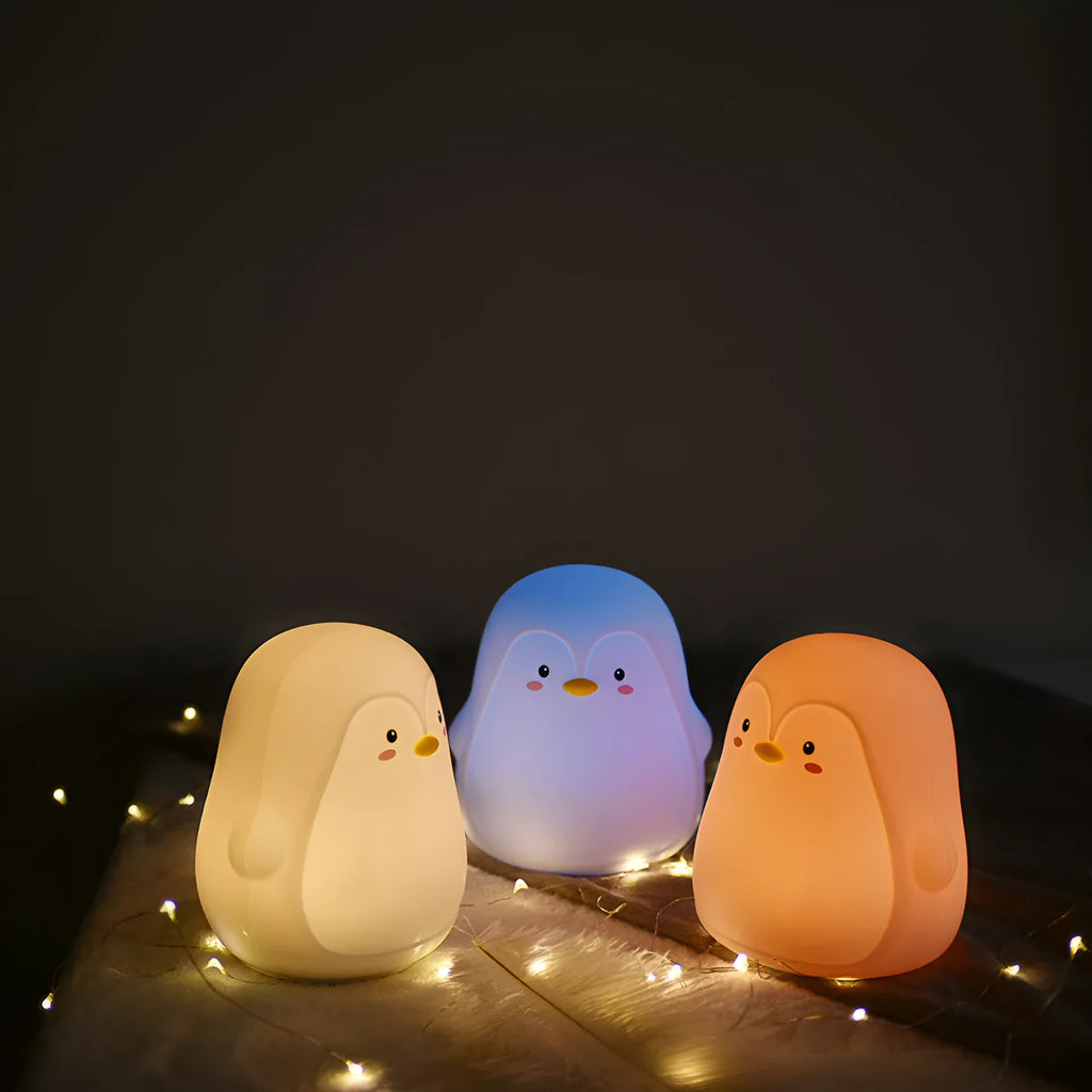 Penguin night light with rechargeable battery, silicone ABS construction, white LED light