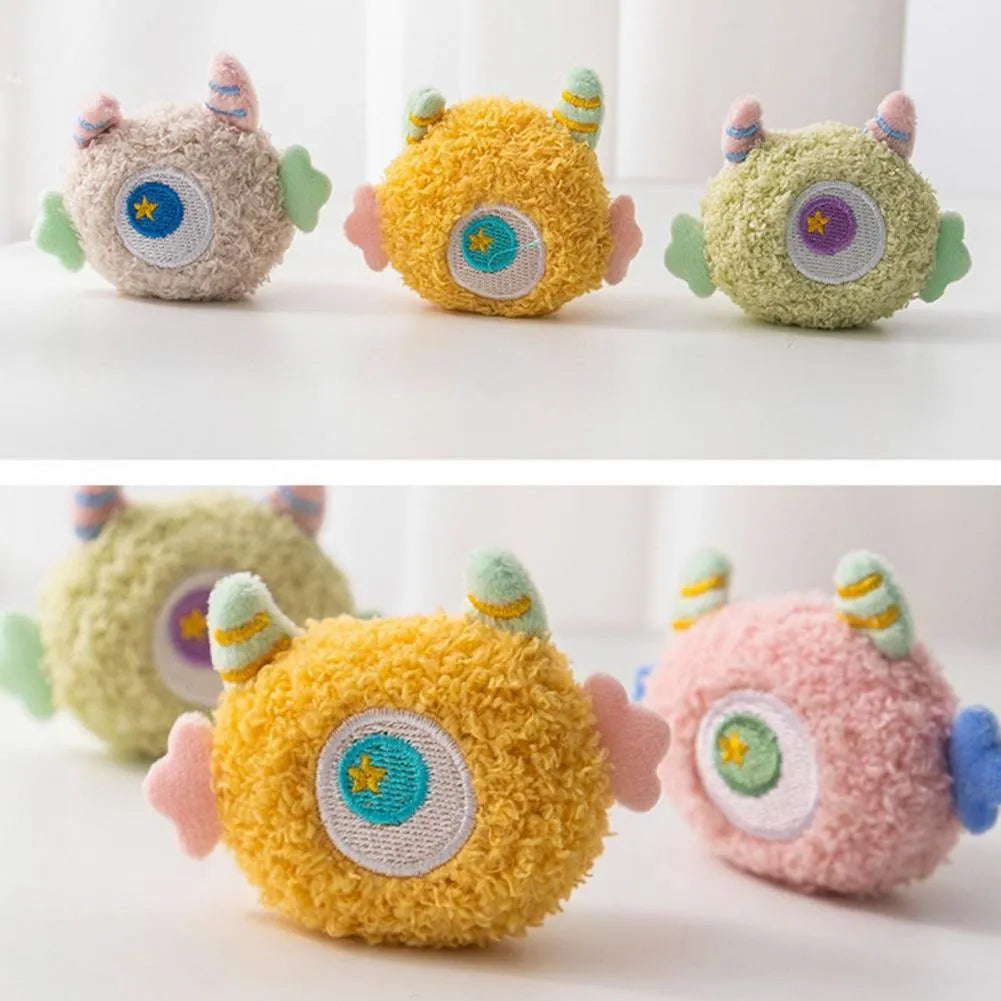 Cartoon-shaped plush dog toy with large eyes and squeaker in grey, green, pink, white or yellow