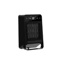 Black desktop warm air blower with touch screen display and remote control on wooden desk