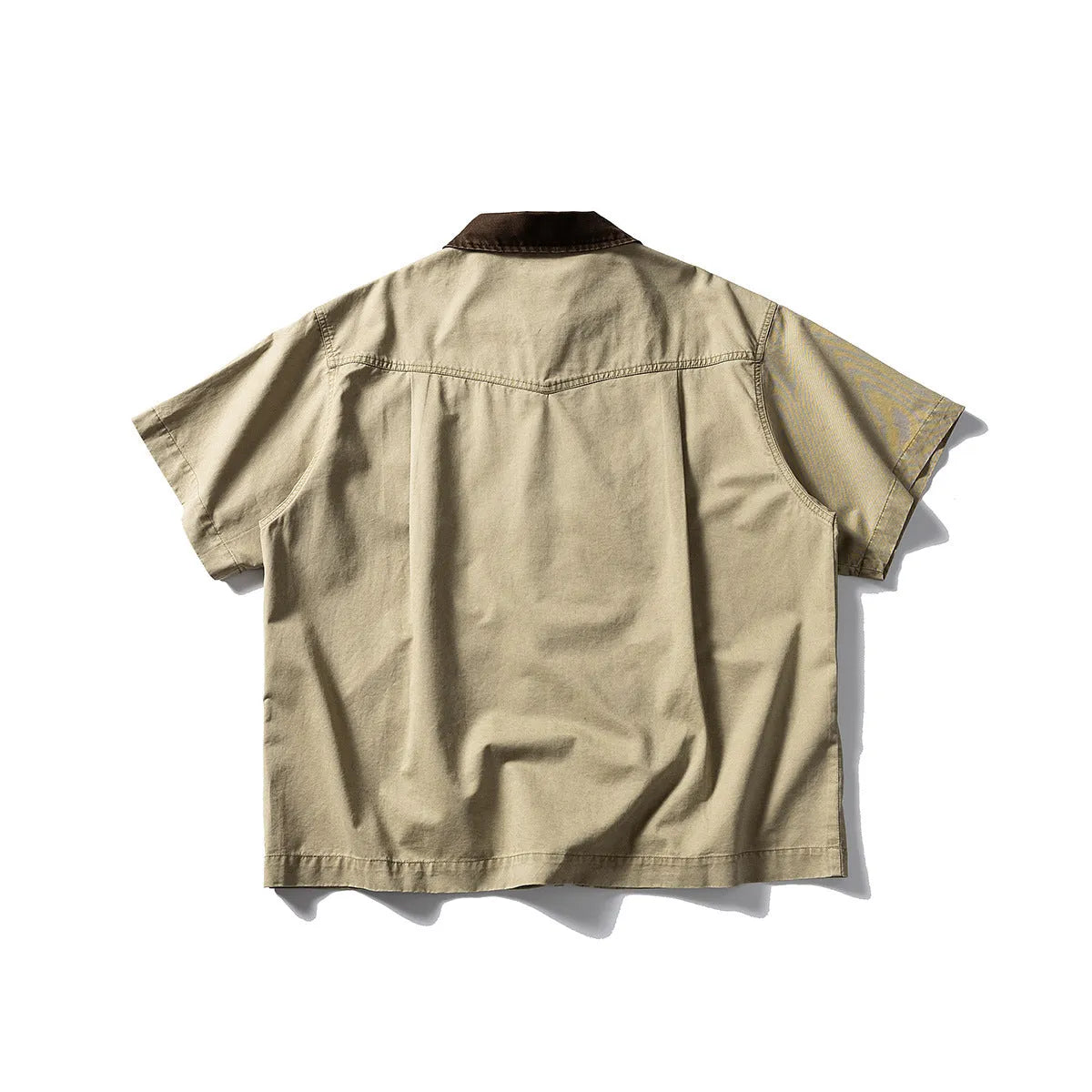 Washed overalls shirt in khaki colour with short sleeves and loose-fit cardigan style for teenagers