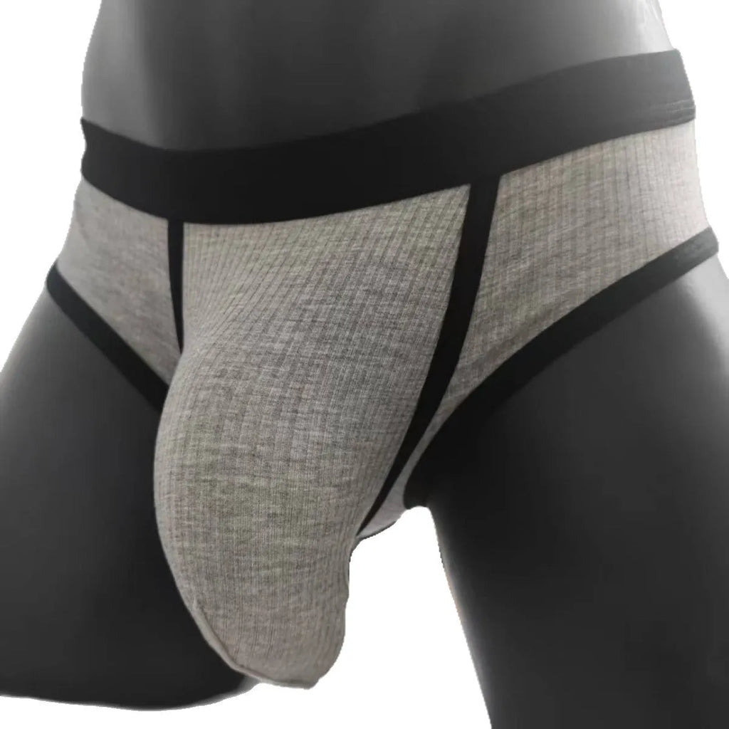 Men's solid colour briefs in viscose fabric with U-shaped design and low waist construction
