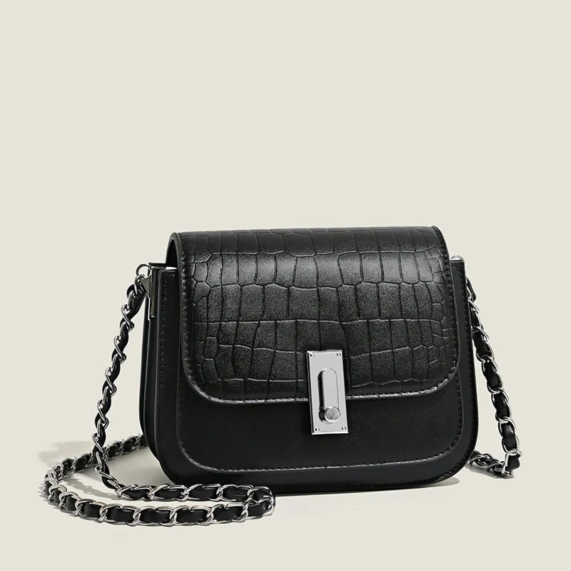 Women's black chain shoulder bag with cross-body strap and internal phone pocket, horizontal square shape
