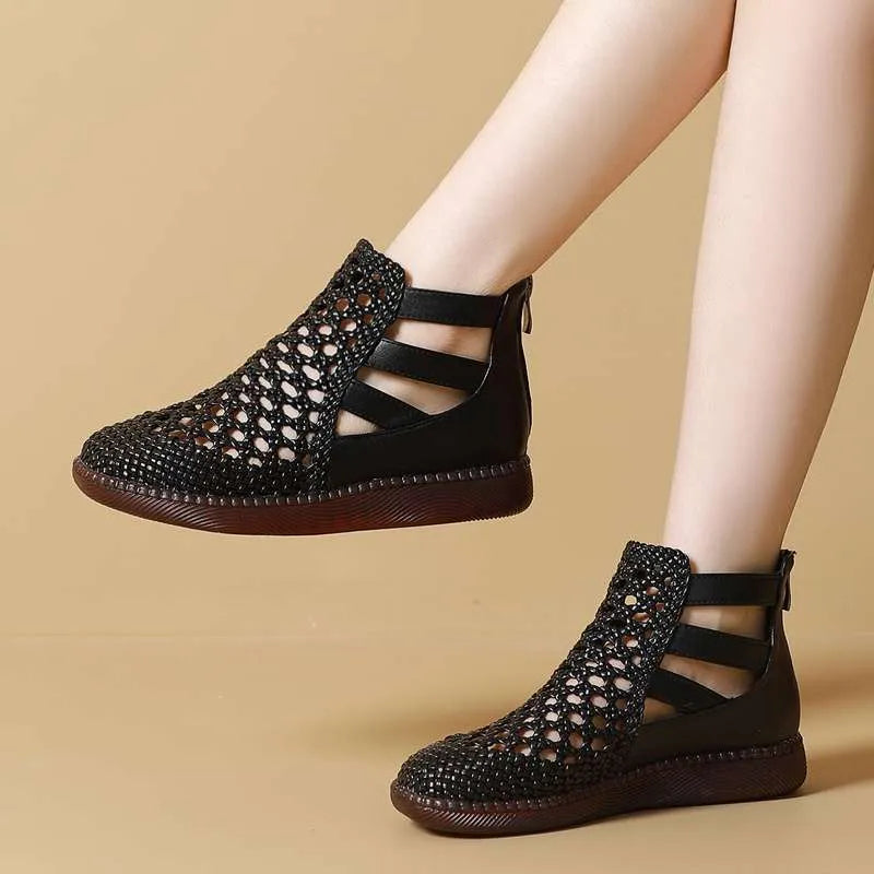 Women's flat sandals with hollow-out design in gold colour showing soft TPR soles and oversleeve style