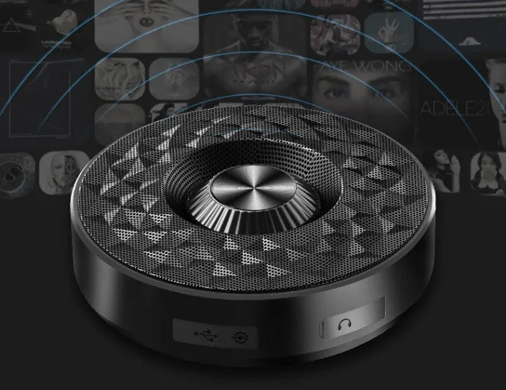 Black Bluetooth mini speaker with control buttons on top, measuring 10cm by 5cm