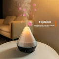 Volcano-shaped white desktop humidifier with colourful flame and smoke ring effect, USB plug-in ultrasonic aromatherapy diffuser