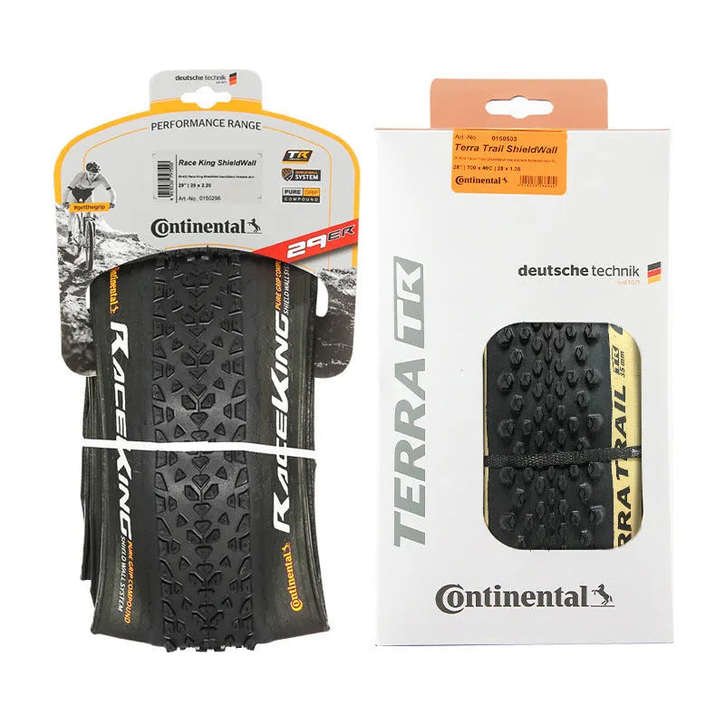 Mountain bike folding outer tyre with 180 TPI casing, shown in yellow or white, suitable for off-road cycling