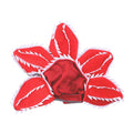 Dog wearing Halloween demon hat costume with headband and flower accessory