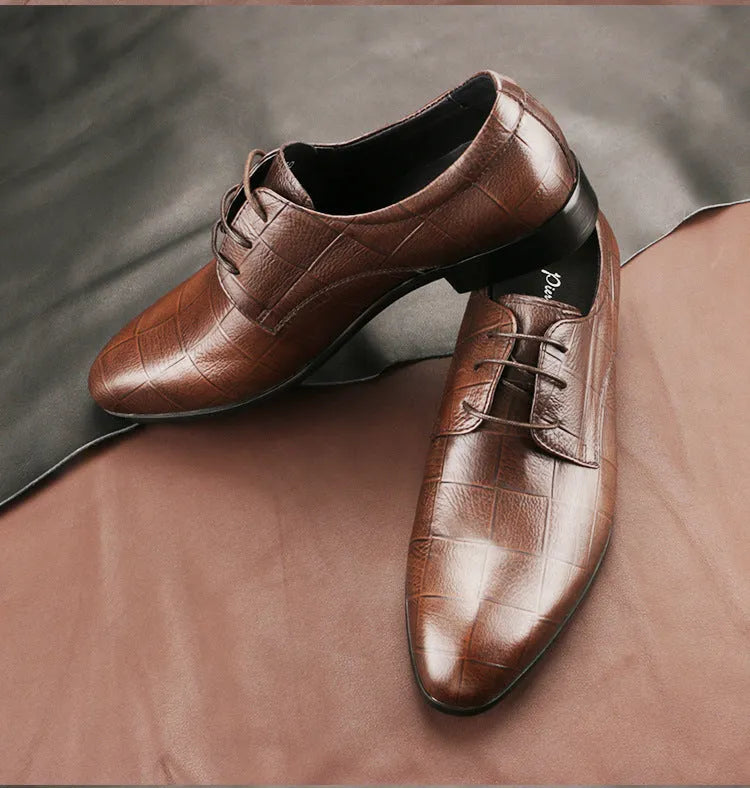 Men's black leather Derby shoes with pointed toe, handmade sewing details, and antiskid rubber sole