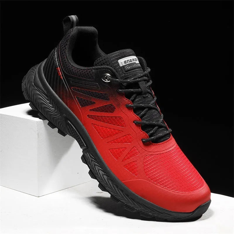 Men's black breathable mesh running shoes with round toe and front lace-up closure on outdoor surface