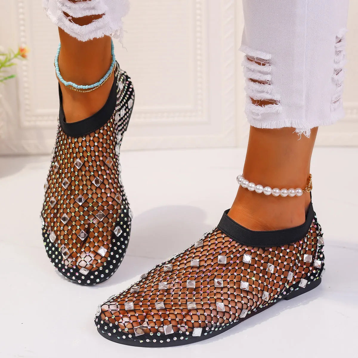Women's mesh flat sandals with colourful rhinestone design on round toe, showing rubber sole and breathable upper