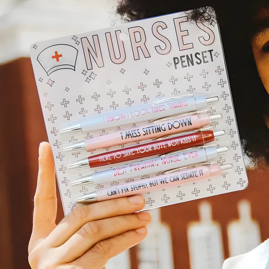 Five nurse theme ballpoint pens with humorous decoration arranged together