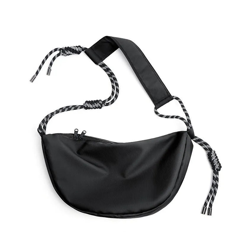 Men's lightweight nylon messenger bag in a solid colour, shown with a large main compartment.
