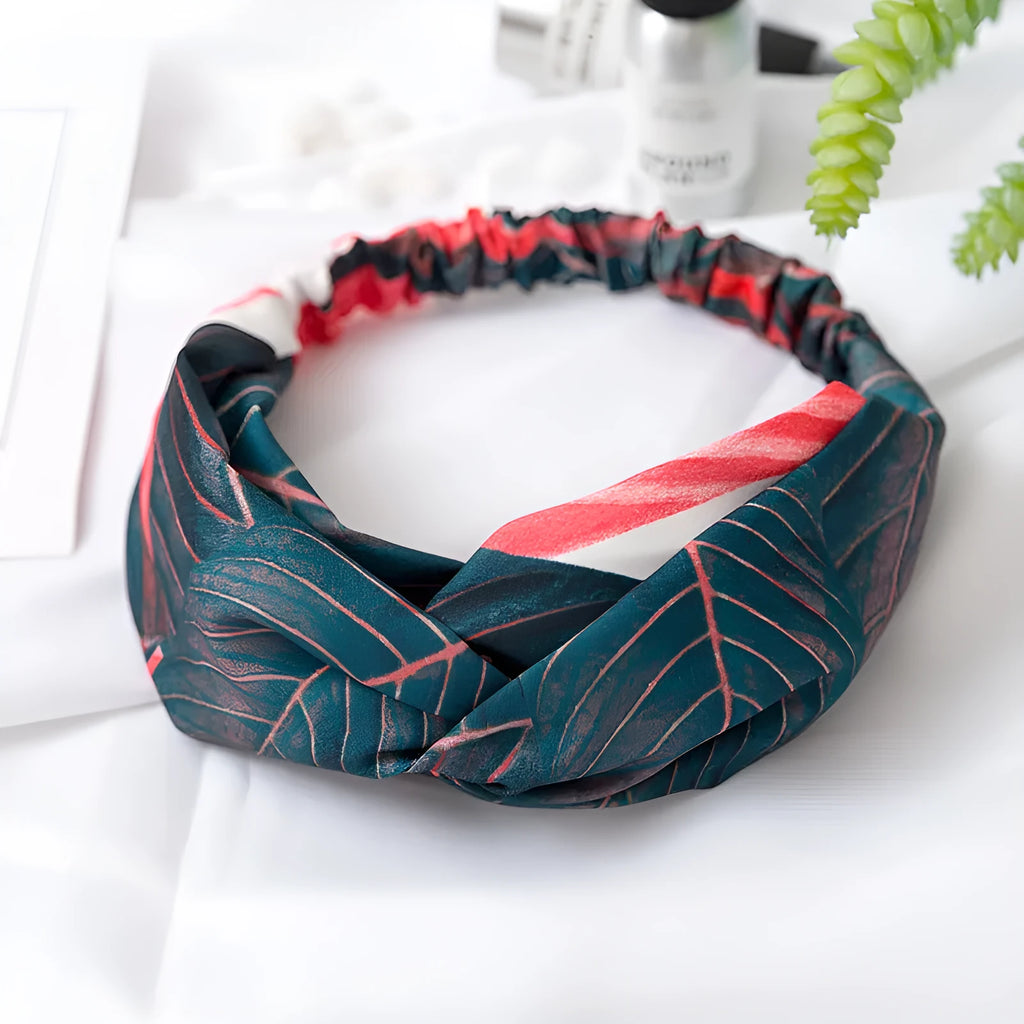 Red cloth women's headband with banana leaf cross design for hair management