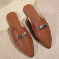 Light brown women's pointed-toe semi-slippers with a low heel and rubber sole.