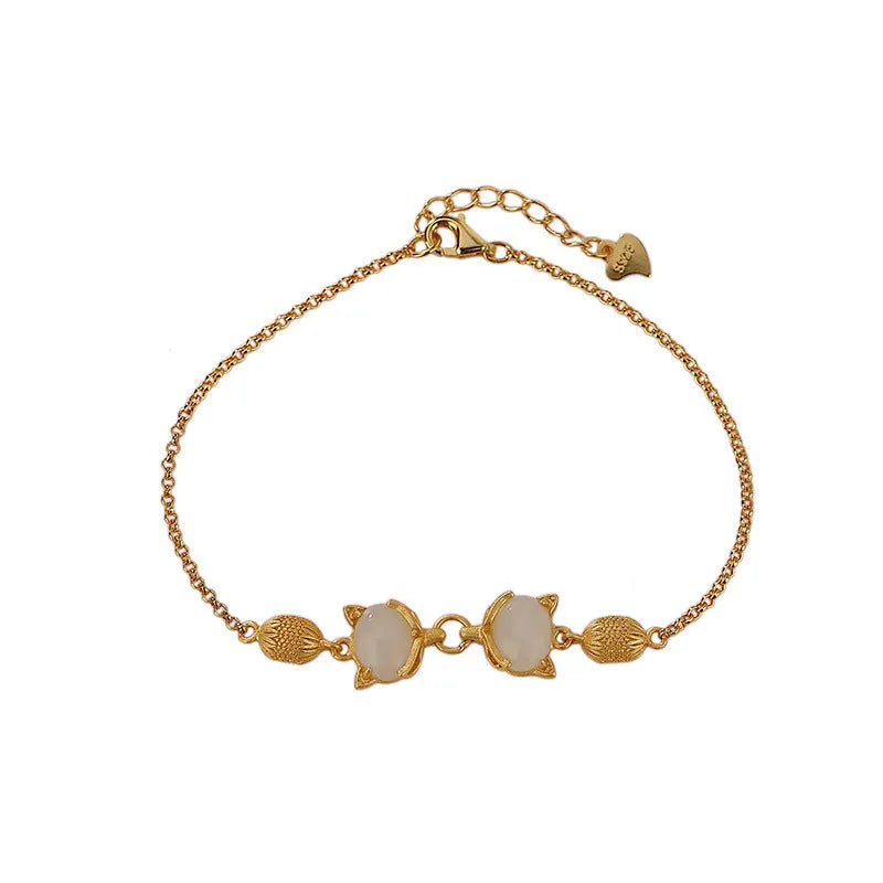 925 silver women's bracelet with fox charm and genuine Hetian jade stone on adjustable chain.
