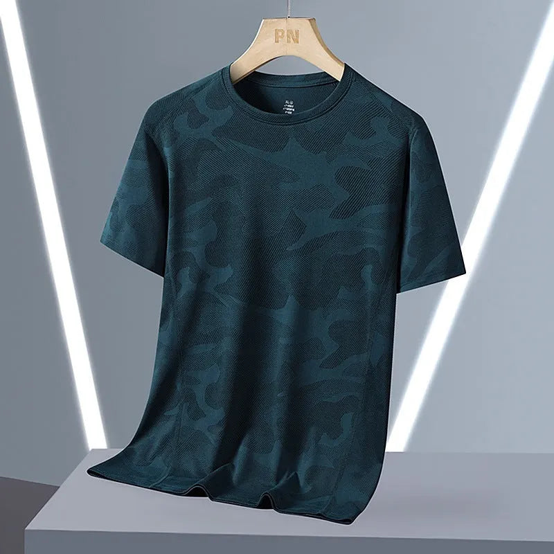 Men's loose fit camouflage short sleeve summer top in quick-drying nylon fabric.
