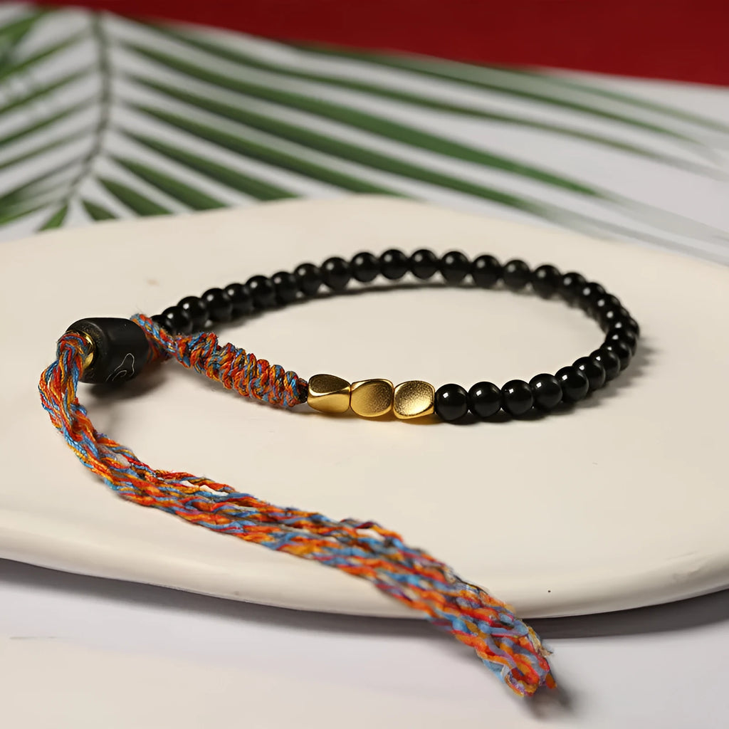 Hand-woven obsidian carrying strap with adjustable 15.5-16cm length and 4mm width, unisex design
