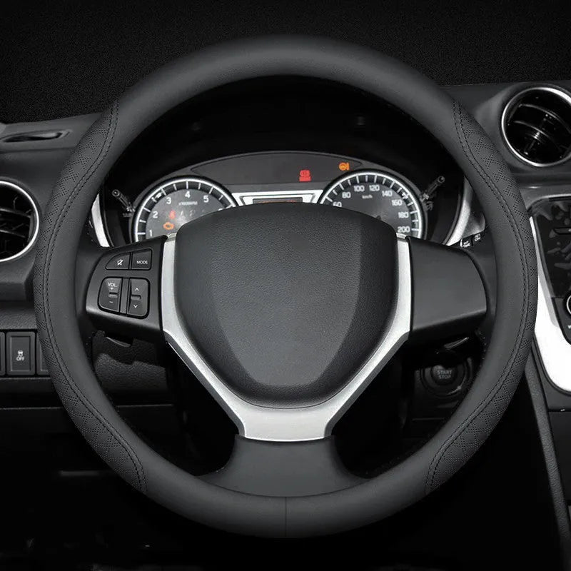 Black leather steering wheel cover with two-color stitching on Suzuki steering wheel, showing 38cm diameter and ultra-thin design