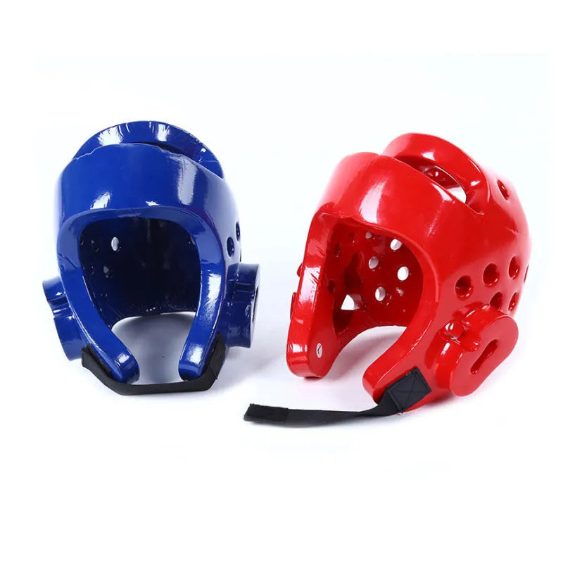Red and blue martial arts protective gear set showing leg guards, boxing gloves, and a helmet for taekwondo and karate.