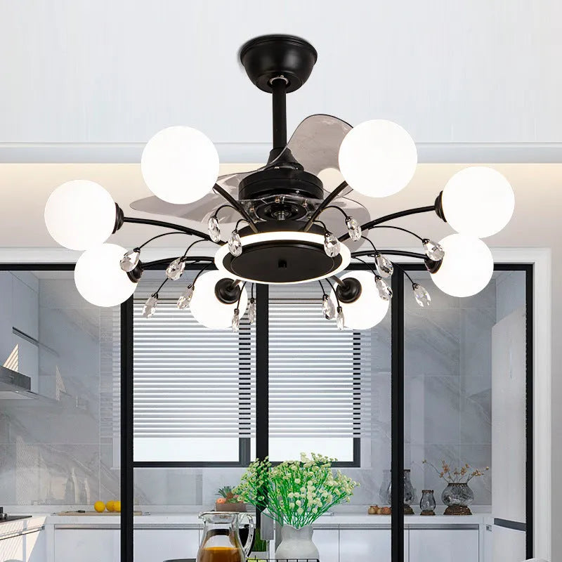 Gold ceiling fan lamp with metal blades and acrylic lampshade, showing remote control for tri-colour lighting and airflow adjustment