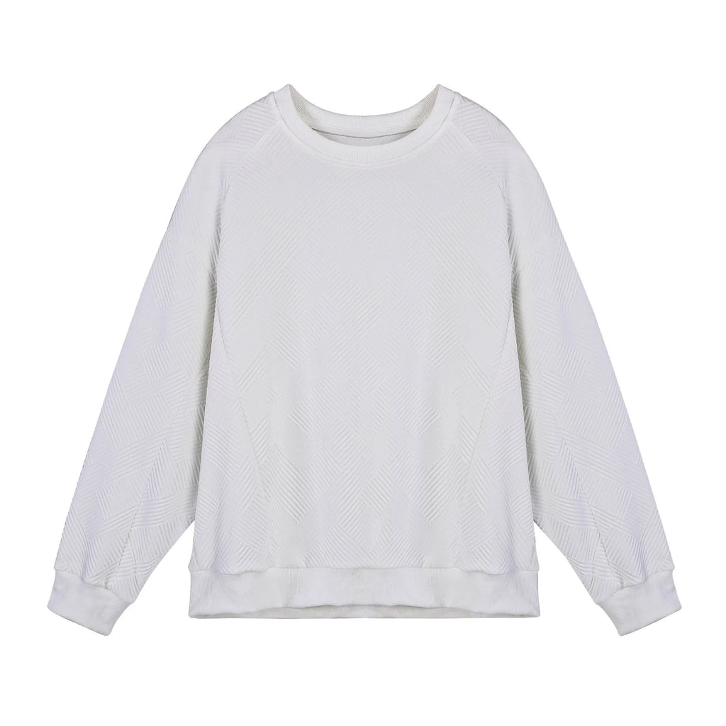 Men's solid colour long-sleeved sweater in twill jacquard fabric, shown in a loose fit with a round neck.