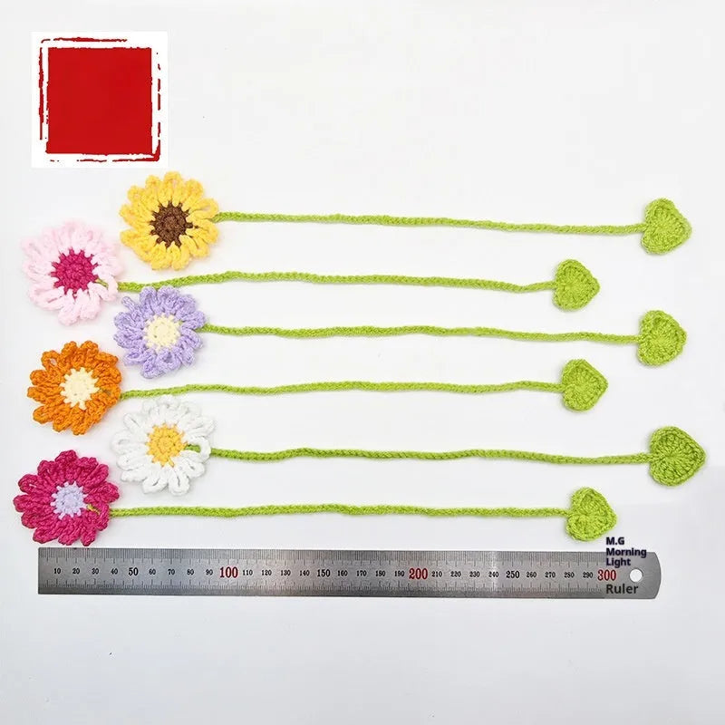 Hand-crocheted wool bookmark with flexible wire core and four milk cotton strands in Little Daisy design