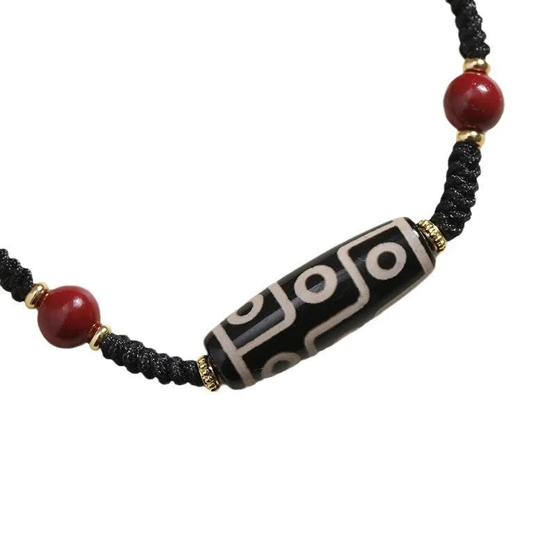 Tibetan agate dzi bead bracelet with stainless steel adjustable clasp showing 30 models of beads