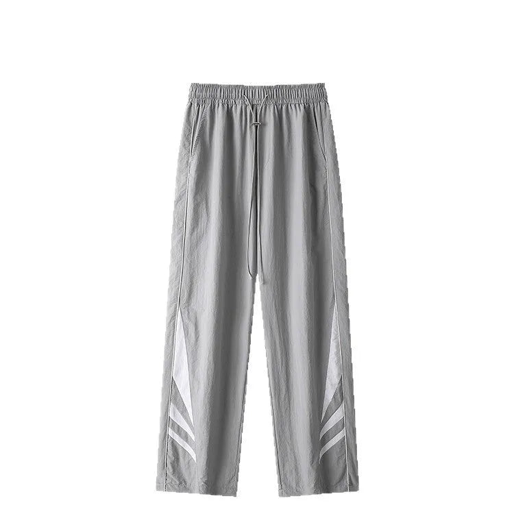 Straight-leg cotton blend trousers in black or grey with button fly and mid-waist design