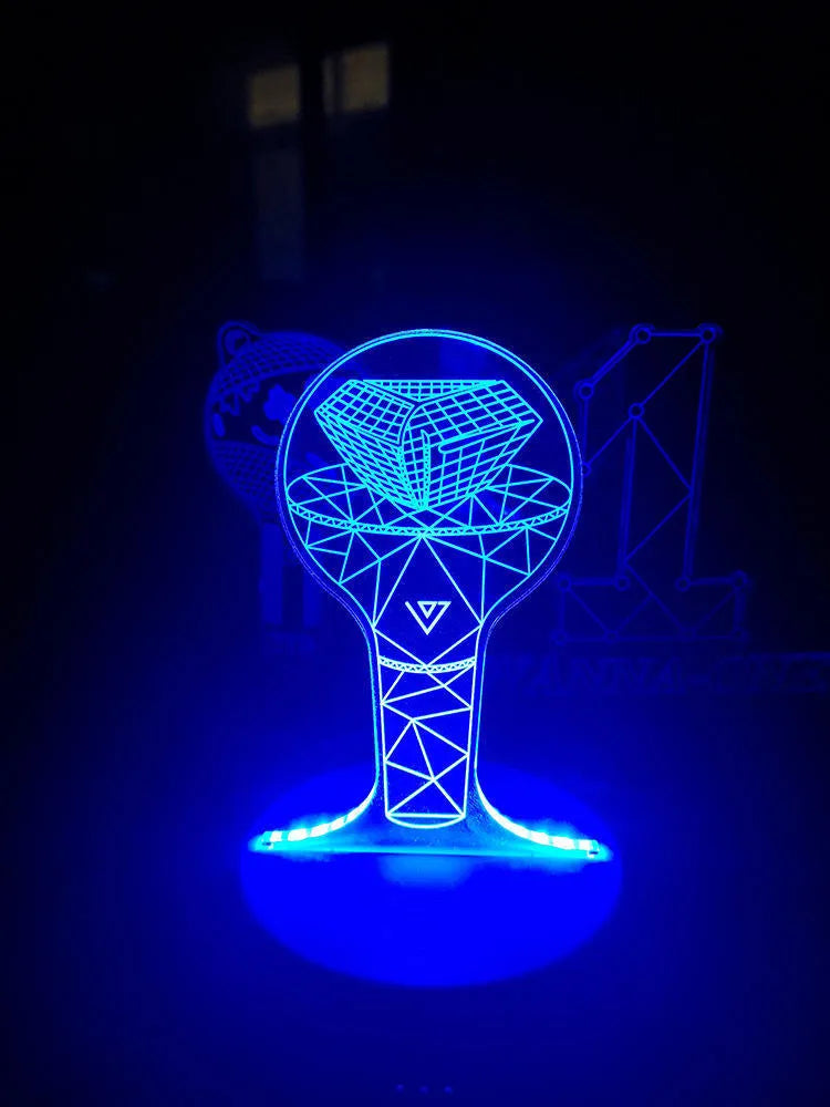 BTS-themed acrylic light-up display stand holding BTS Light 101 Tower Gem collectible