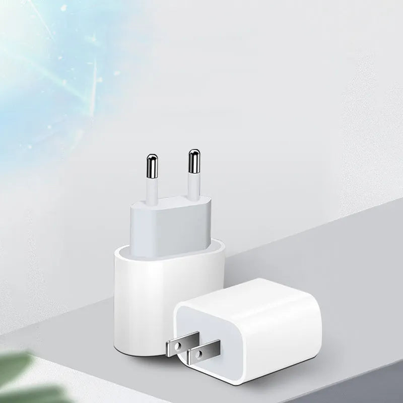 Mobile phone charger with USB port and American or European plug options for 3100mA charging