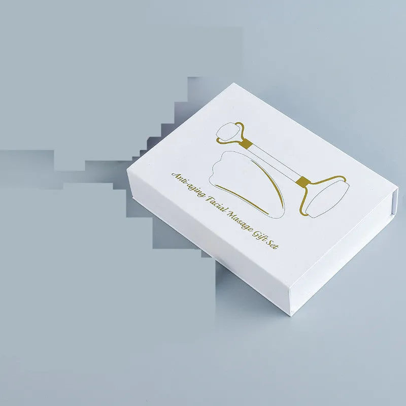 White jade roller and scraping board set for facial massage with double-headed design
