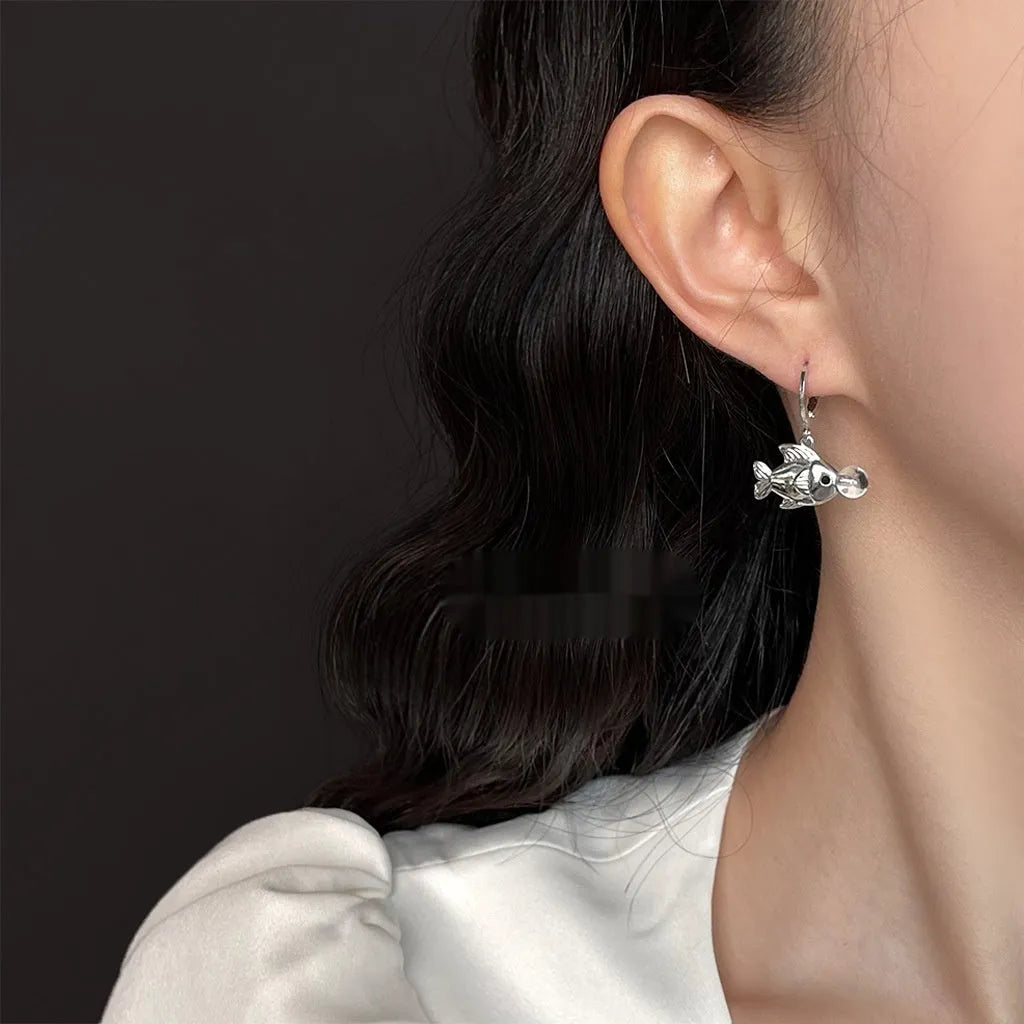 Gold-coloured bubble fish design copper earrings with animal modelling detail