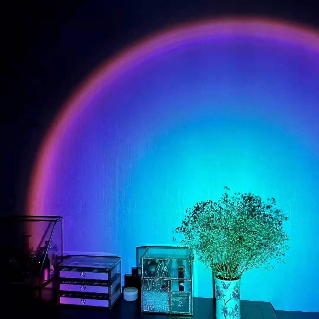 USB rechargeable rainbow projection lamp showing sunset red colour projection on wall