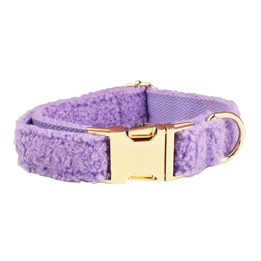 Four-piece cloth dog set showing collar, leash, bow, and vest for small to extra large dogs