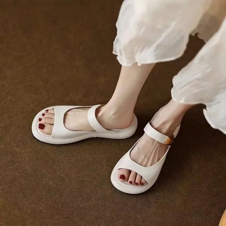 Apricot and white peep toe flat platform sandals with a French soft leather upper.