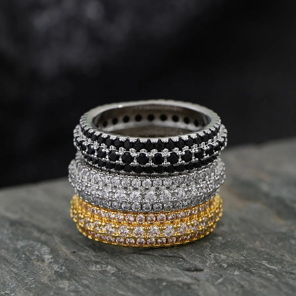Geometric copper ring with triangle zircon inlay, shown in three metal colour options
