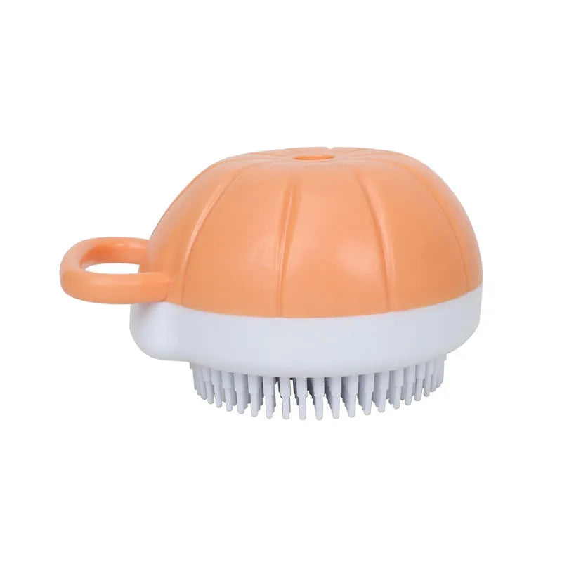 Orange TPR dog bath brush with shampoo dispenser and comb teeth for pet grooming