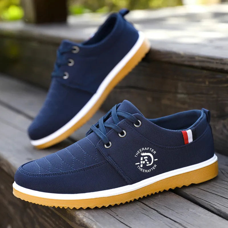 Men's black canvas casual shoes with a leather toe cap, sewing line details, and a thick EVA platform sole.
