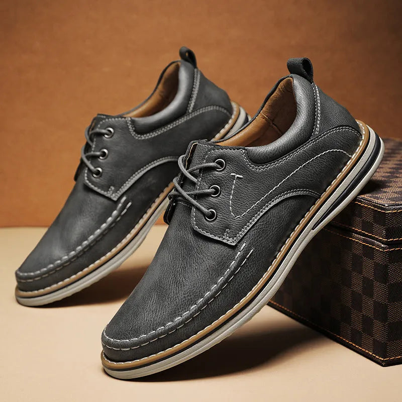 Men's brown genuine leather casual shoes with round toe and lace-up front on rubber sole