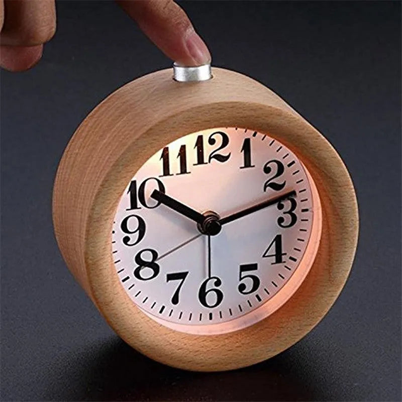 Solid beech wood circular alarm clock with silent snooze function measuring 9.5cm in diameter