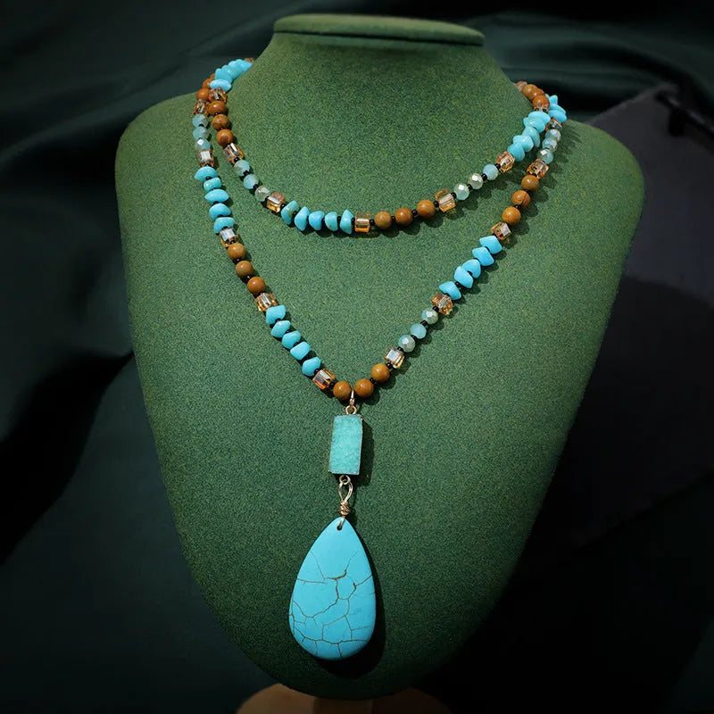Blue turquoise heart-shaped pendant necklace with water drop silhouette on 81cm ball bead chain